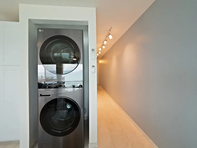 In-unit stacked LG washer and dryer